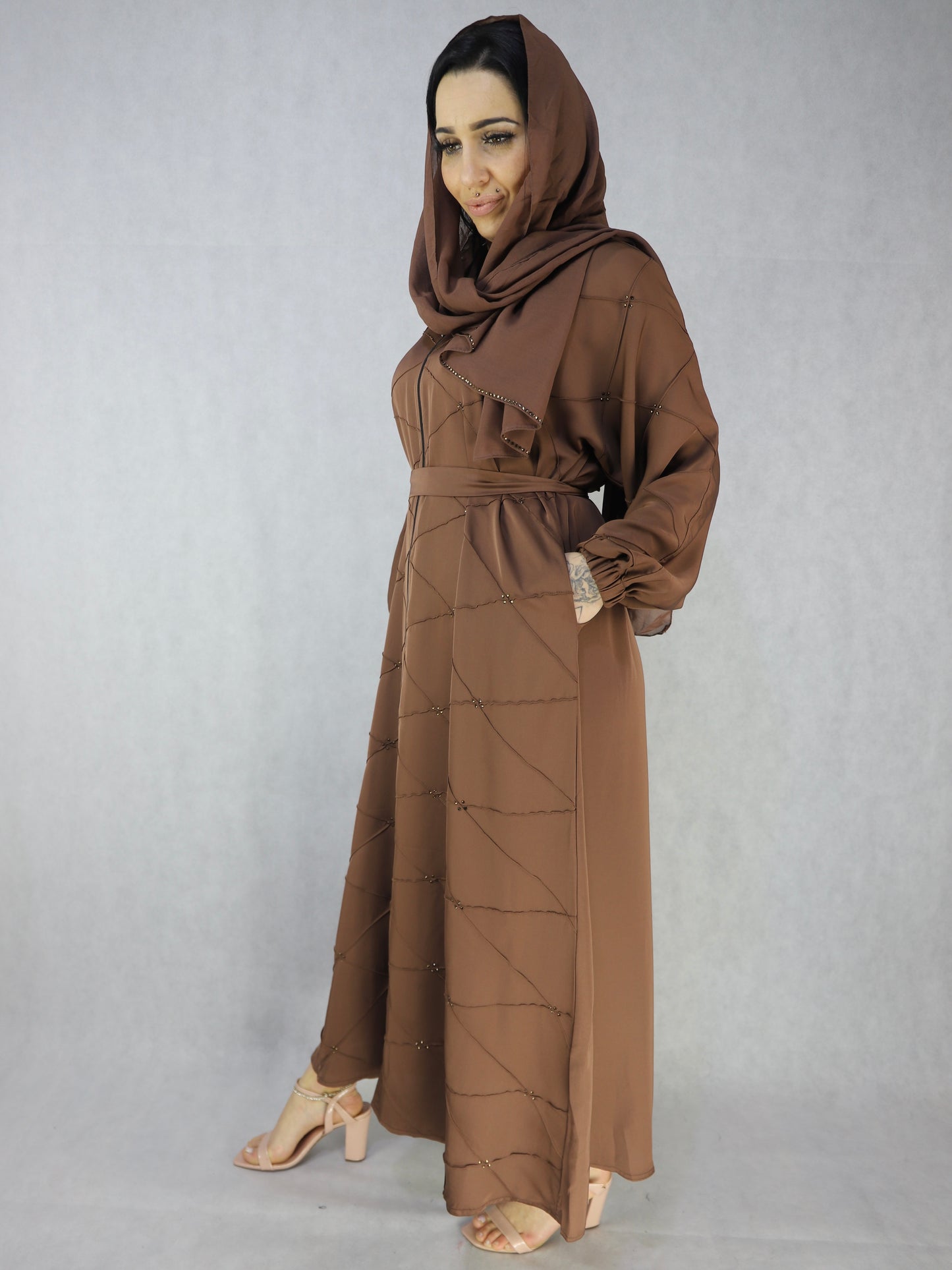 Brown color open abaya with zip going down Modest abaya,abaya, abayas,modest abaya dress, modest dresses, black abaya, modest dress, abaya united kingdom, white abaya, abaya for women, modest dresses for women, modest maxi dresses, women abaya, abaya dress dresses, abayas for women, jilbab abaya islamic clothing modest clothing for women modest clothing dresses
