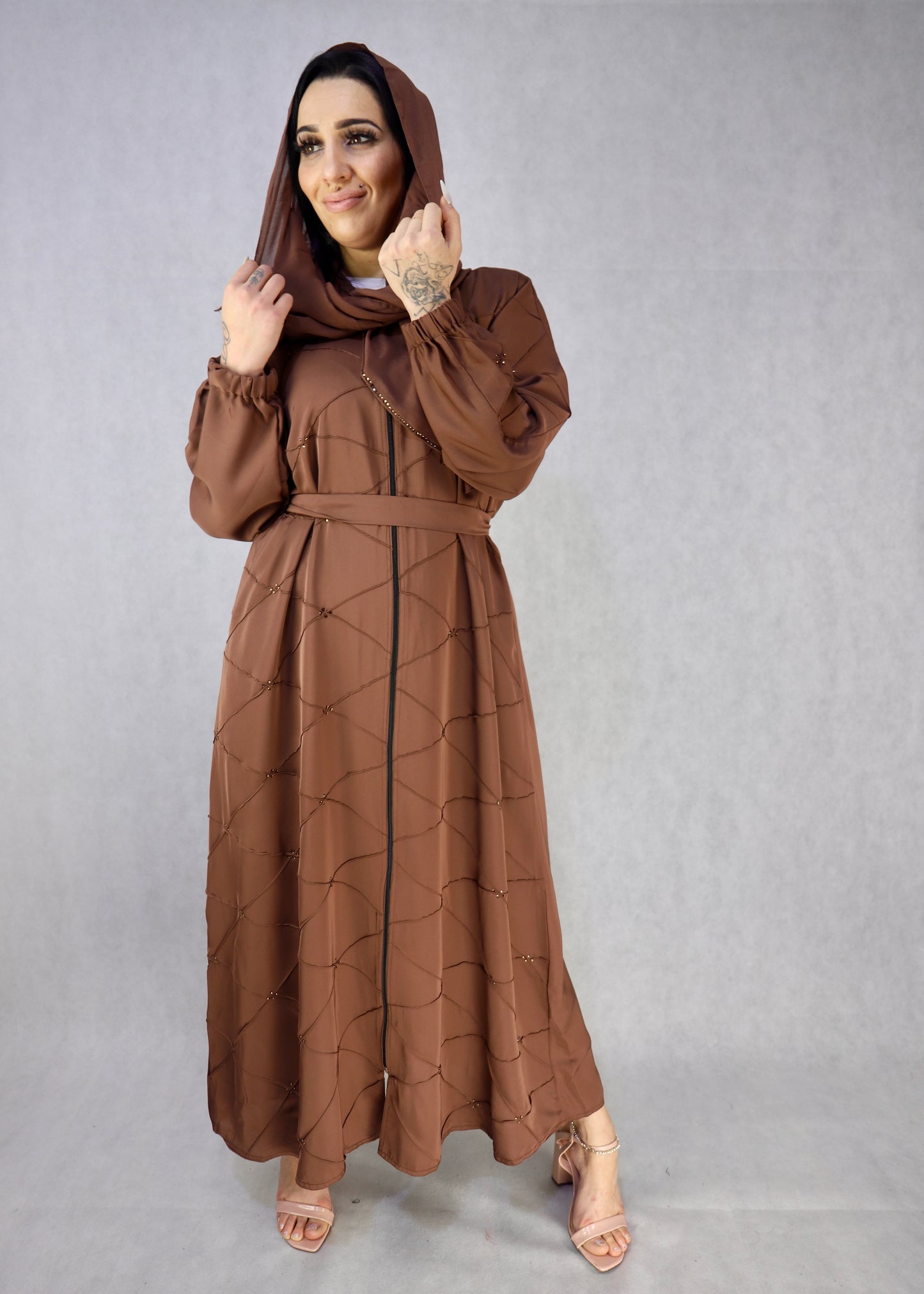 Brown color open abaya with zip going down Modest abaya,abaya, abayas,modest abaya dress, modest dresses, black abaya, modest dress, abaya united kingdom, white abaya, abaya for women, modest dresses for women, modest maxi dresses, women abaya, abaya dress dresses, abayas for women, jilbab abaya islamic clothing modest clothing for women modest clothing dresses