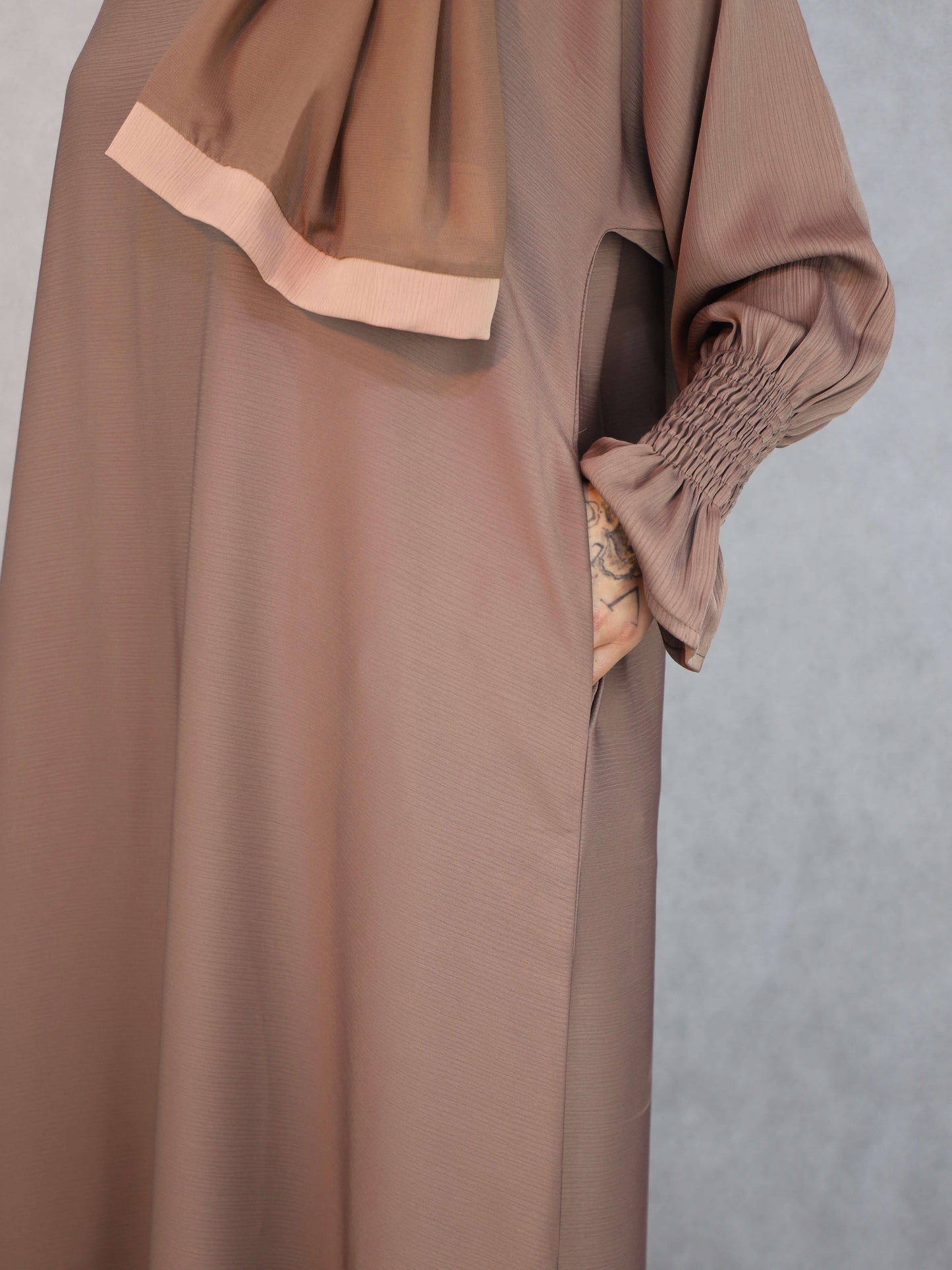 Zoom Material Abaya With Elasticated Sleeves.