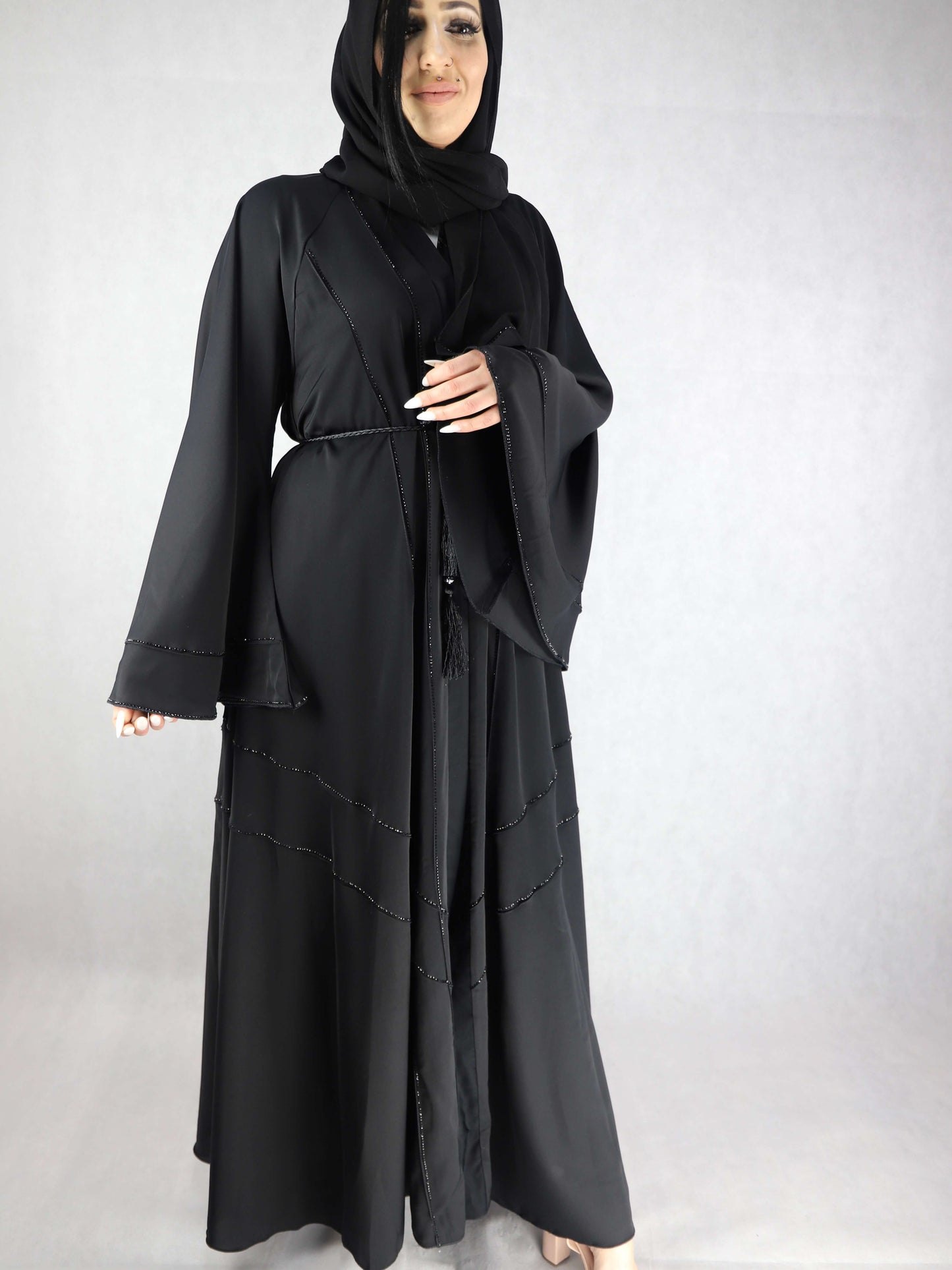 Nida material three pieces open abaya. Black colour